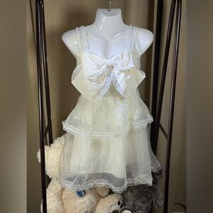 Elegant White Layered Dress with Bow